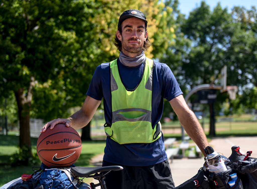 Before taking a photo of the court for his upcoming project, Leo Walsh stands for a portrait